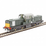 Model train on a railway track with a green and yellow color scheme.