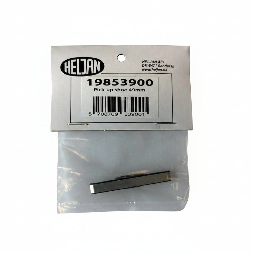 A small metal pick-up shoe part in a clear plastic bag with a white paper label. The label shows the brand HELJAN, part number 19853900, and the text 'Pick-up shoe 49mm'.